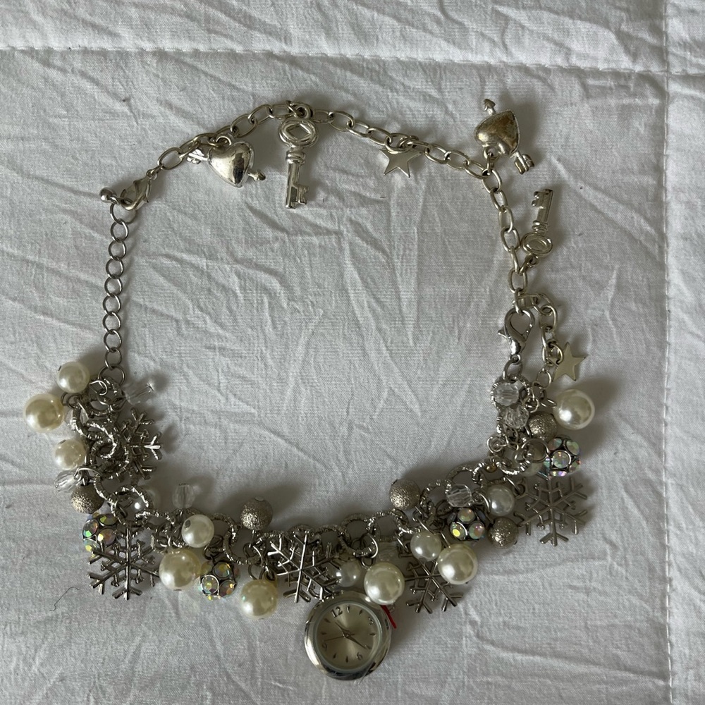 Winter Multicharm bracelet with clock